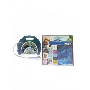 Two Disney Frozen themed products: A scrapbook page kit and a sing-along boombox